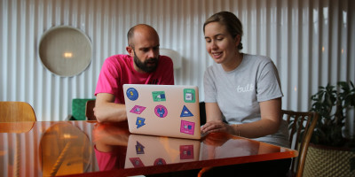 Team Bulb put culture stickers on their laptops