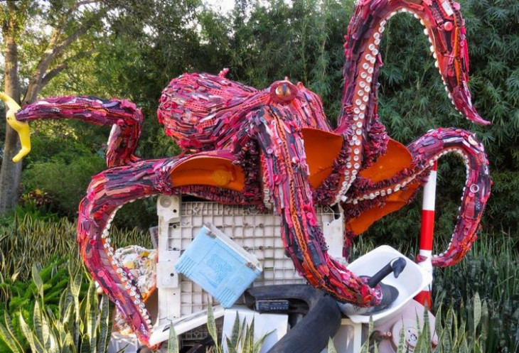 A sculpture of an octopus made from plastic found in the ocean