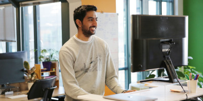 Ashwin, a data scientist, working at his desk