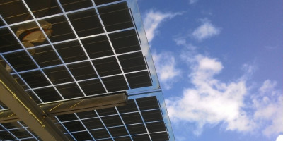 A picture of solar panels on a building