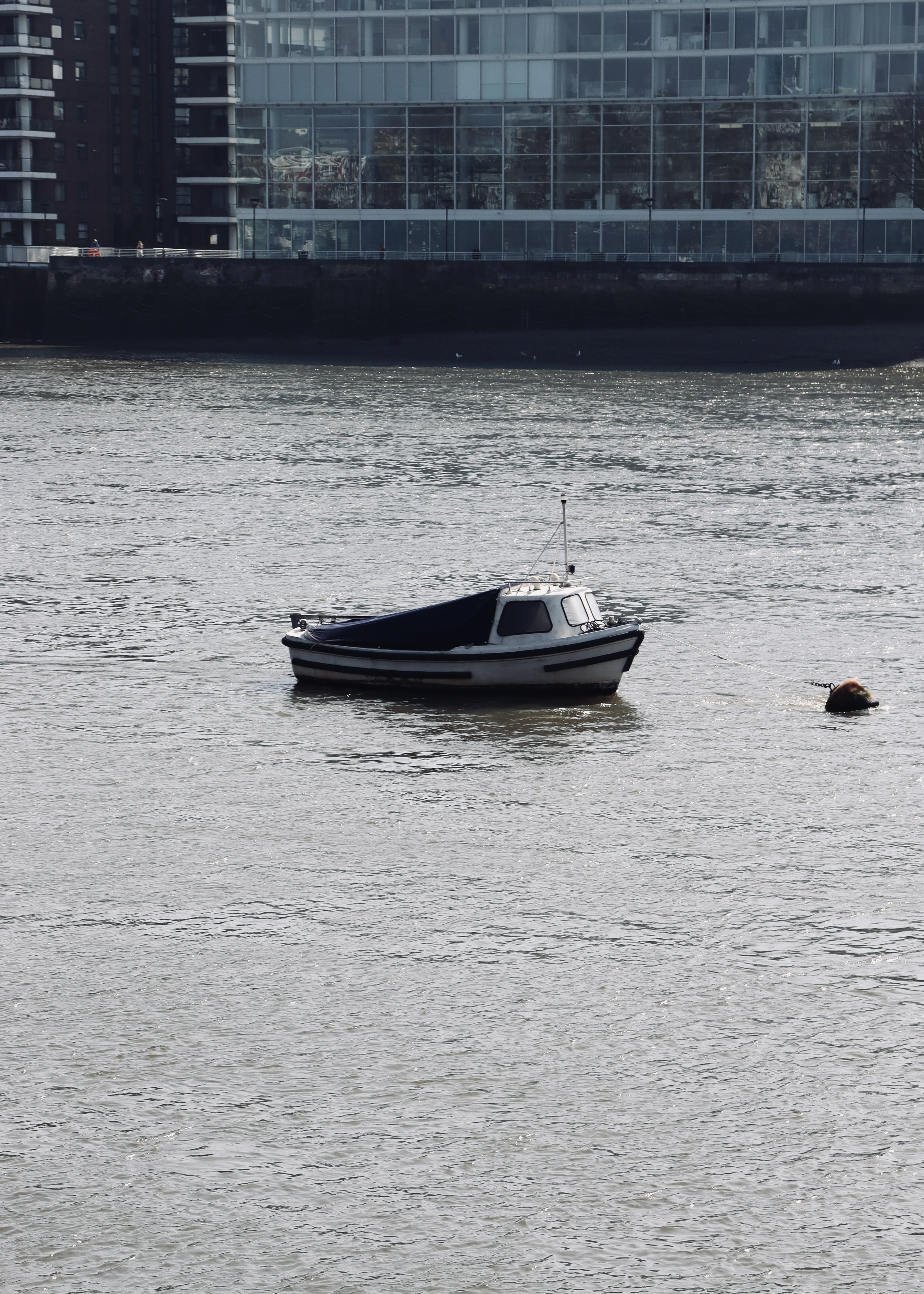 Smaller boat on water