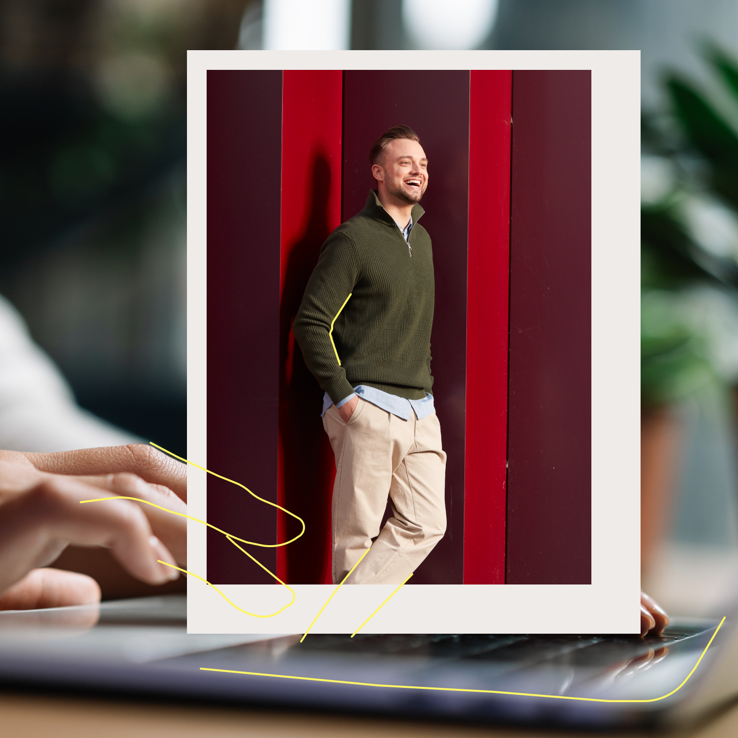 Man standing in front of red wall