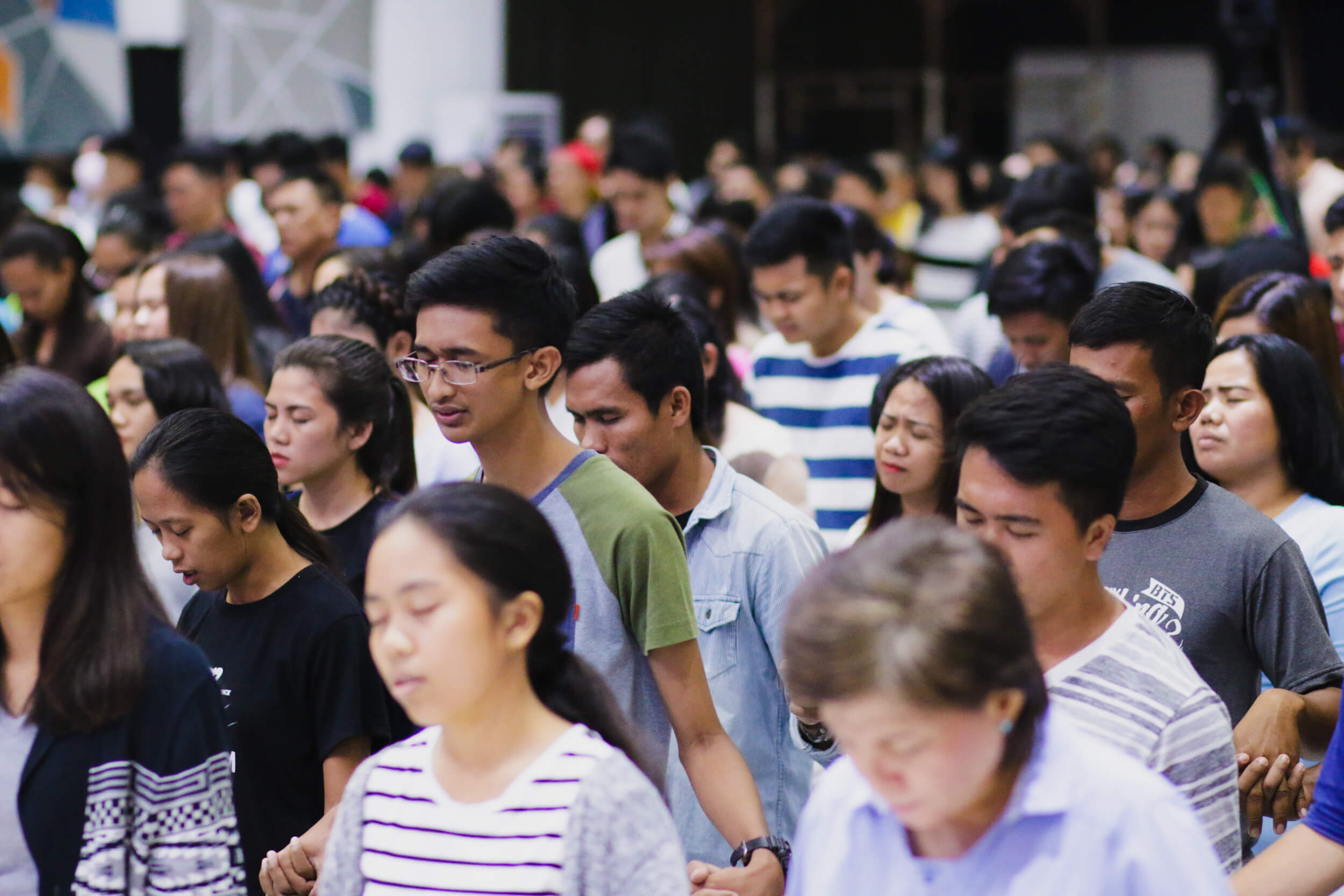 Crowd at Christ Fellowship Church International (CCFI) praying as one during the prophetic conference. 