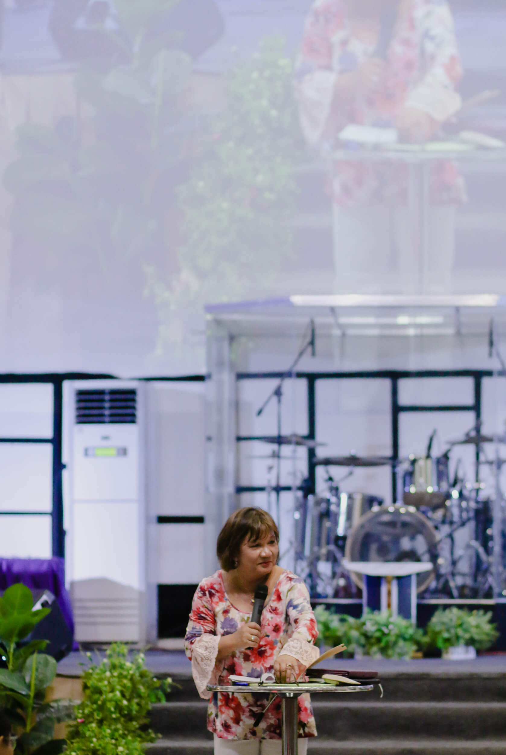 Cristina Sosso smiling onstage at the Prophetic Conference in General Santos City.
