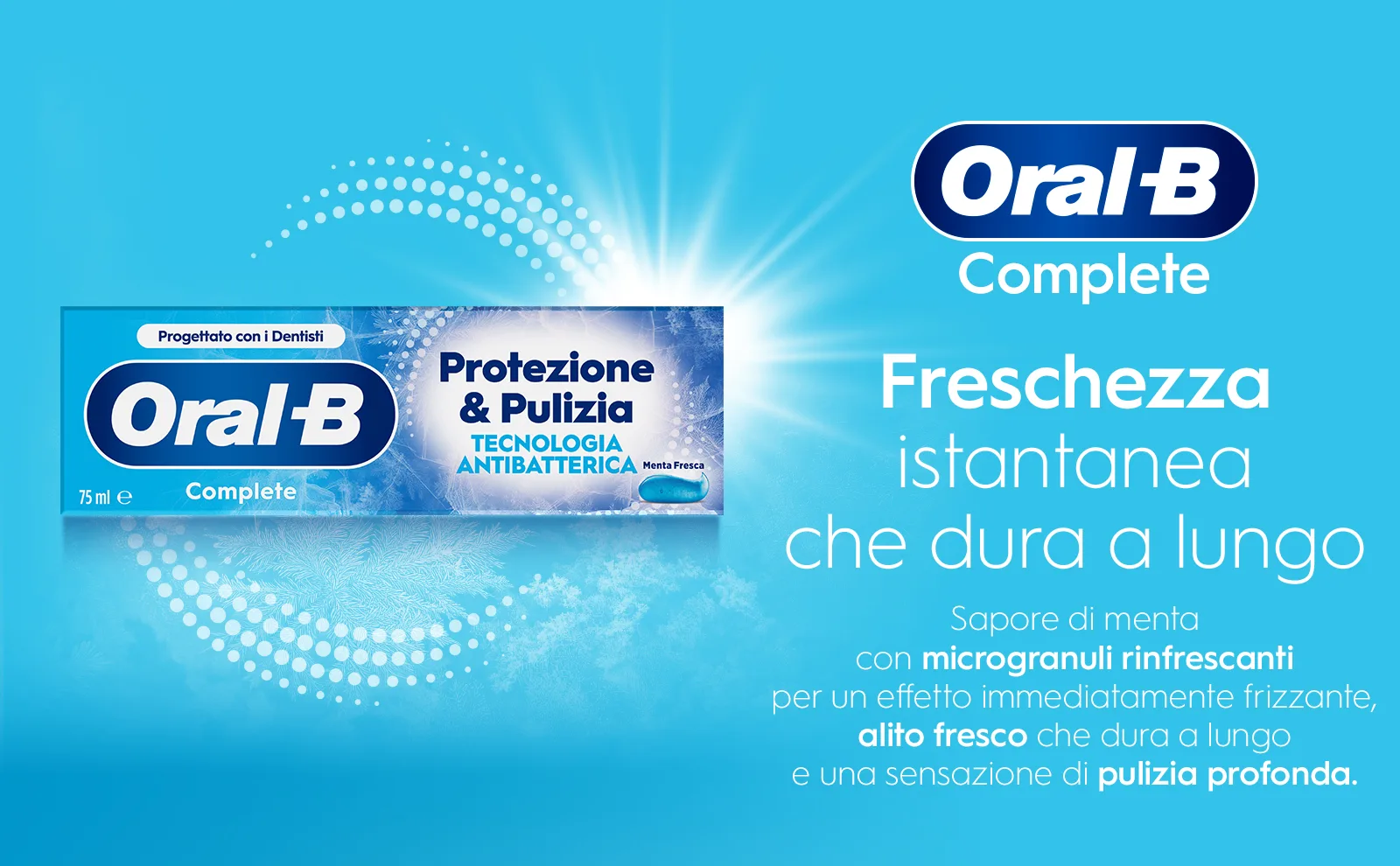 Scatola del dentifricio circondata da fiocchi di neve e una barriera 