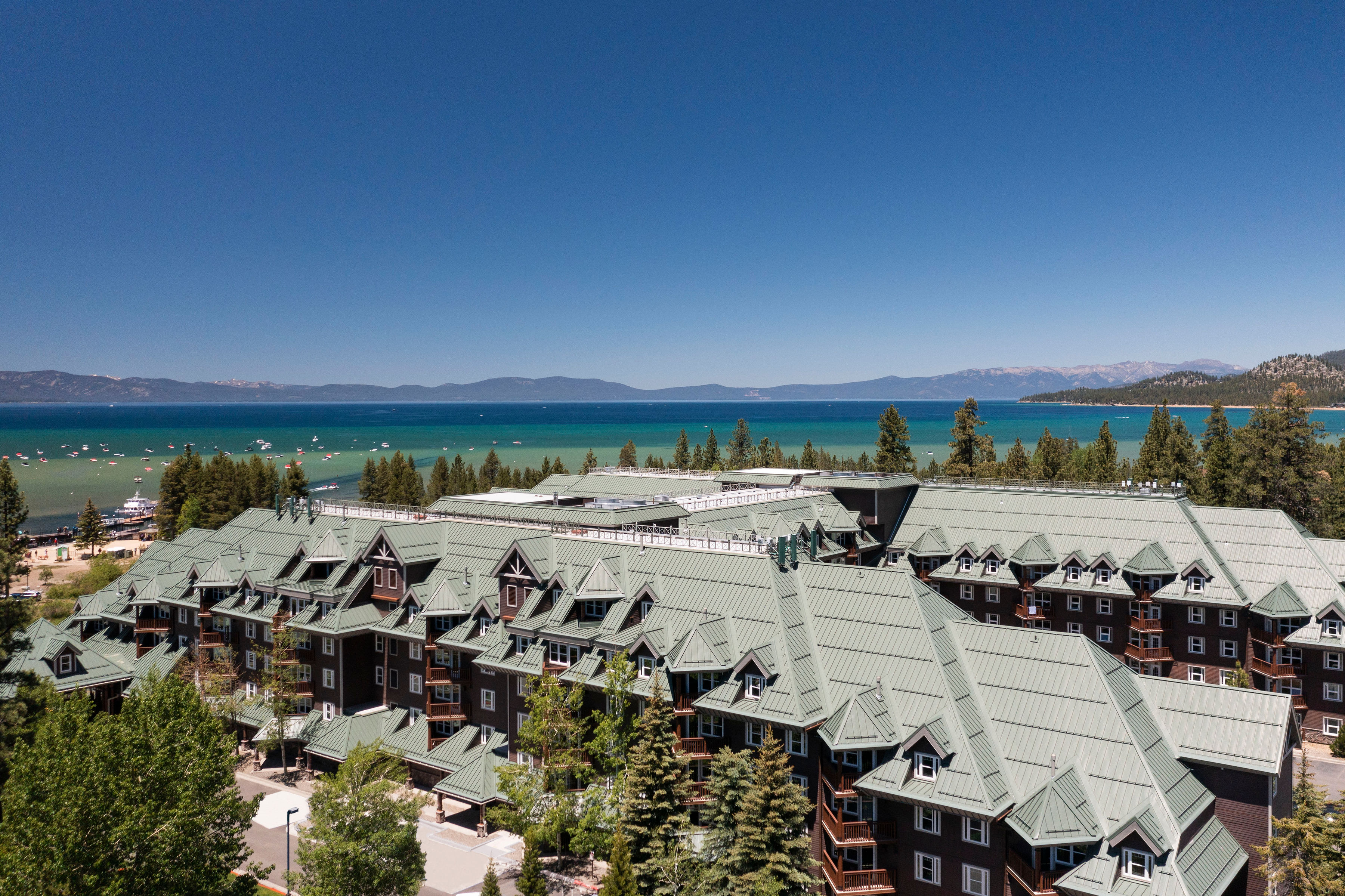 Aerial view of Hilton Vacation Club Lake Tahoe Resort with Lake Tahoe in the background