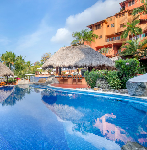 Poolside lounge chairs at Hilton Grand Vacations Club Zihuatanejo