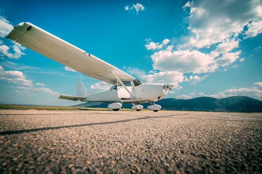 Private plane and Hilton Grand Vacations property.