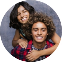 Boy and girl smiling icon