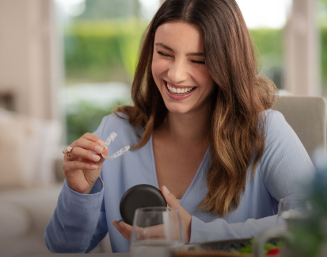 girl with smile and aligners