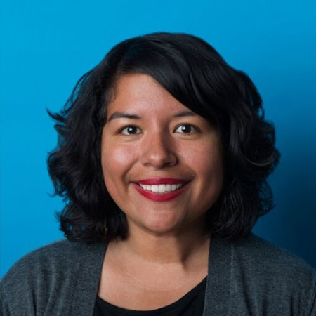 Woman smiling after successful Invisalign® treatment
