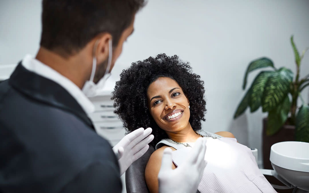 Woman getting a dental consultation