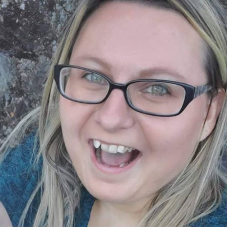 Young woman before Invisalign® treatment