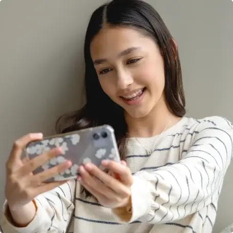 MAOB | image-text-and-media-girl-looking-at-phone