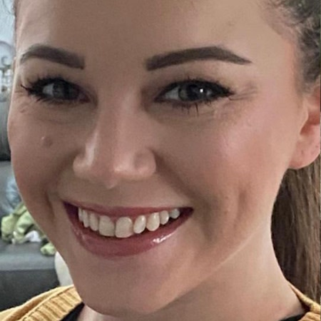 Young woman before Invisalign® treatment
