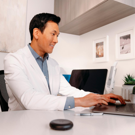 image-text-and-media-doctor-on-laptop