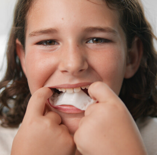 image-hero-boy-holding-palatal-expander