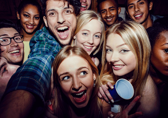 A group of young people taking a selfie