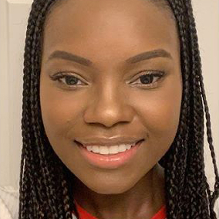 Teen girl smiling after successful Invisalign® treatment