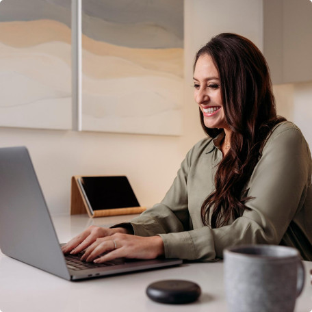 Image-text-and-media-women-smile-at-laptop