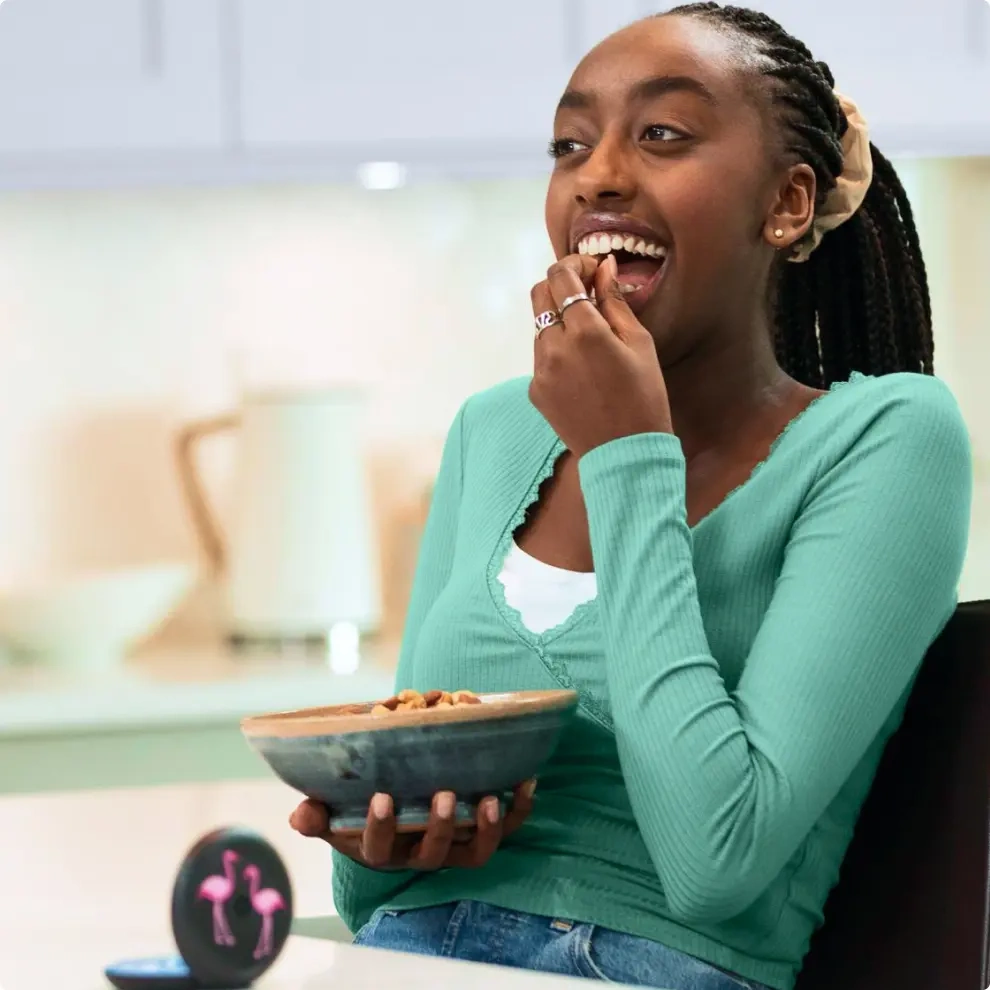 Teen girl eating nuts 
