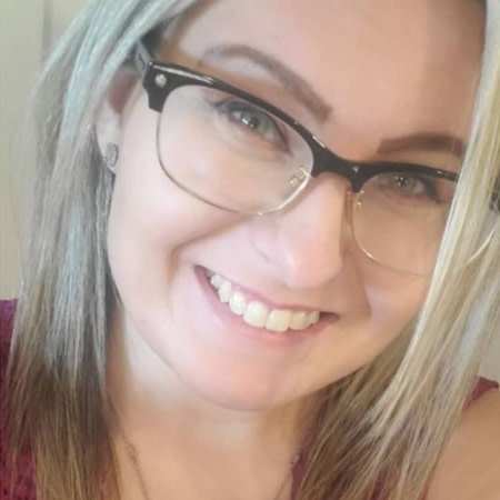 Young woman smiling after successful Invisalign® treatment