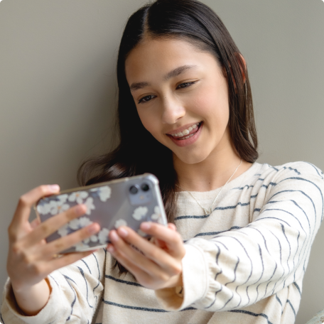 image-text-and-media-girl-looking-at-phone