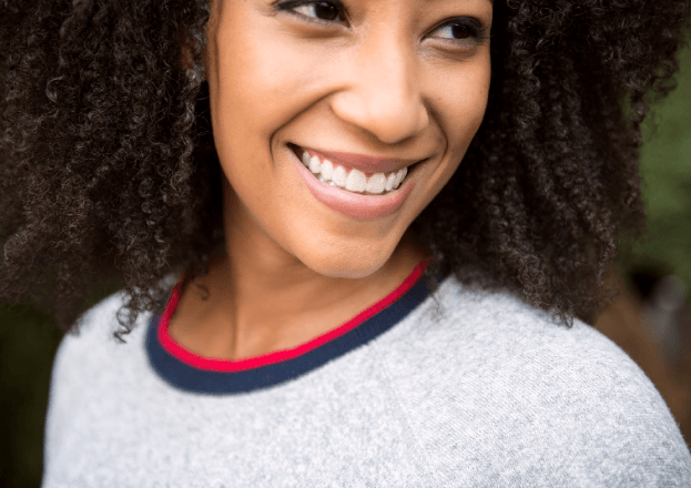 Girl smiling - Invisalign clear aligners