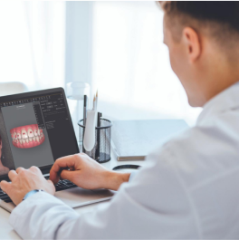 photo-card-dr-working-in-a-laptop