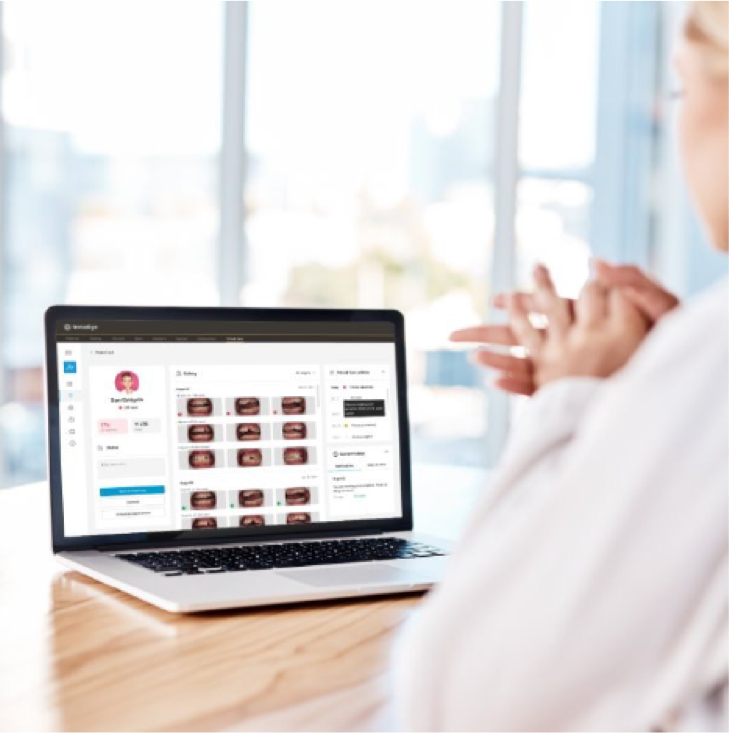 Invisalign doctor using the Invisalign practice app on his computer