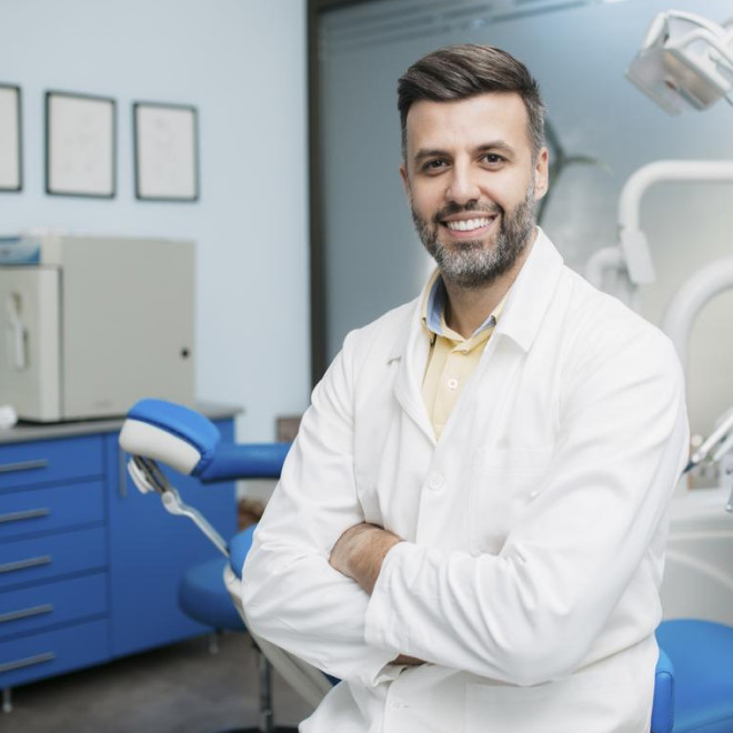Invisalign® doctor smiling to the camera