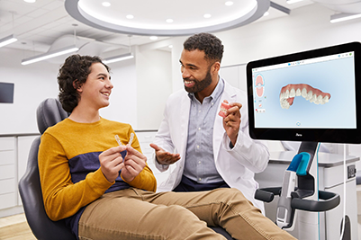 image-big-card-doctor-showing-teeth-module-to-patient