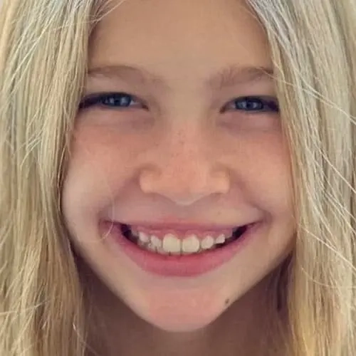 Little blond girl after Invisalign® treatment