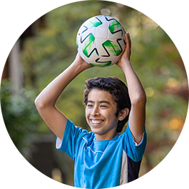 photo-3up-es-boy-holding-soccer-ball
