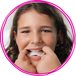 photo-3-up-pink-circle-kid-putting-in-palatal-expander