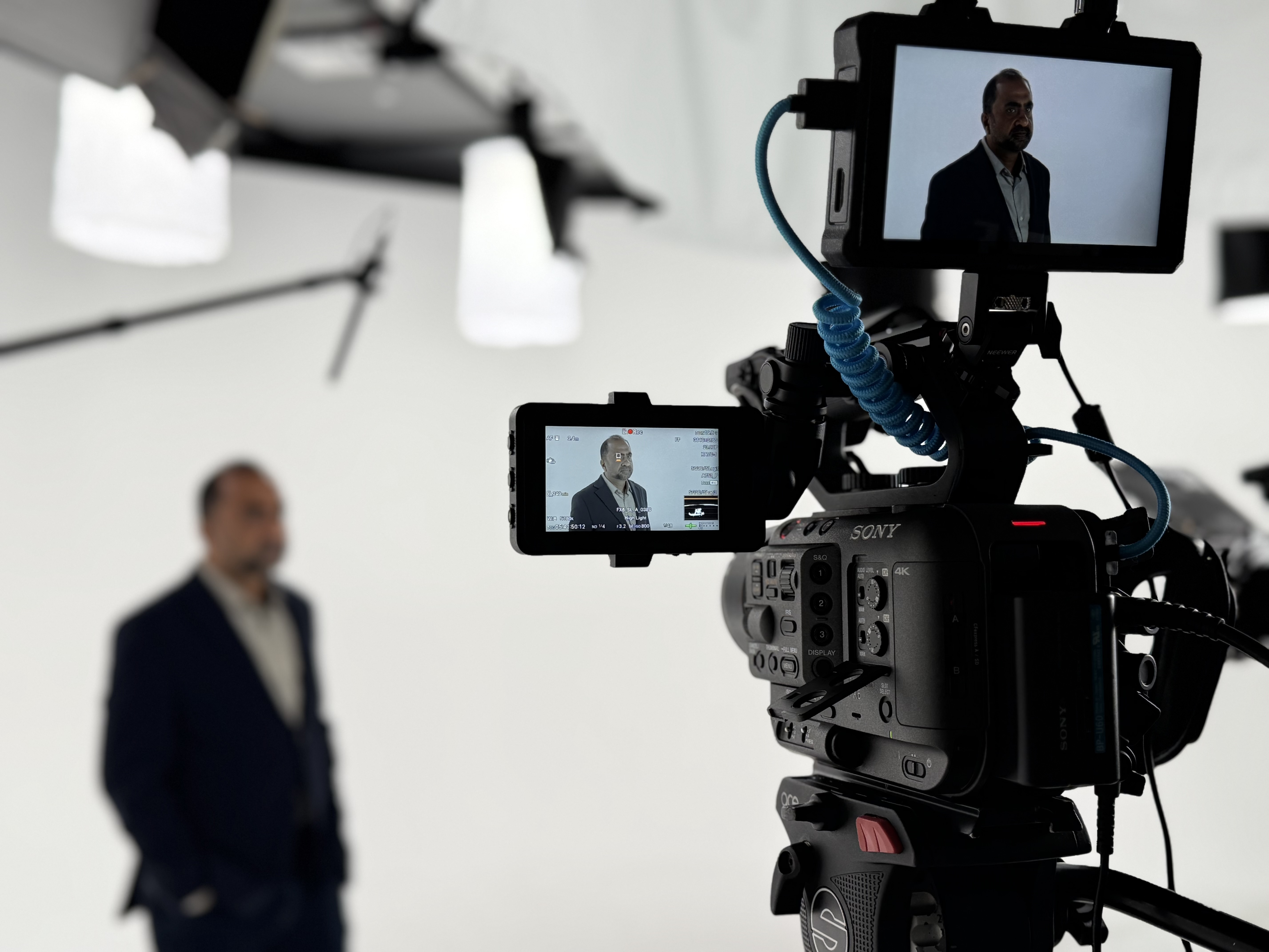 Behind the scenes of The Bureau Media’s video production crew filming executive interviews for Hitachi’s Stories Behind AI series at Hitachi Digital’s Santa Clara headquarters.