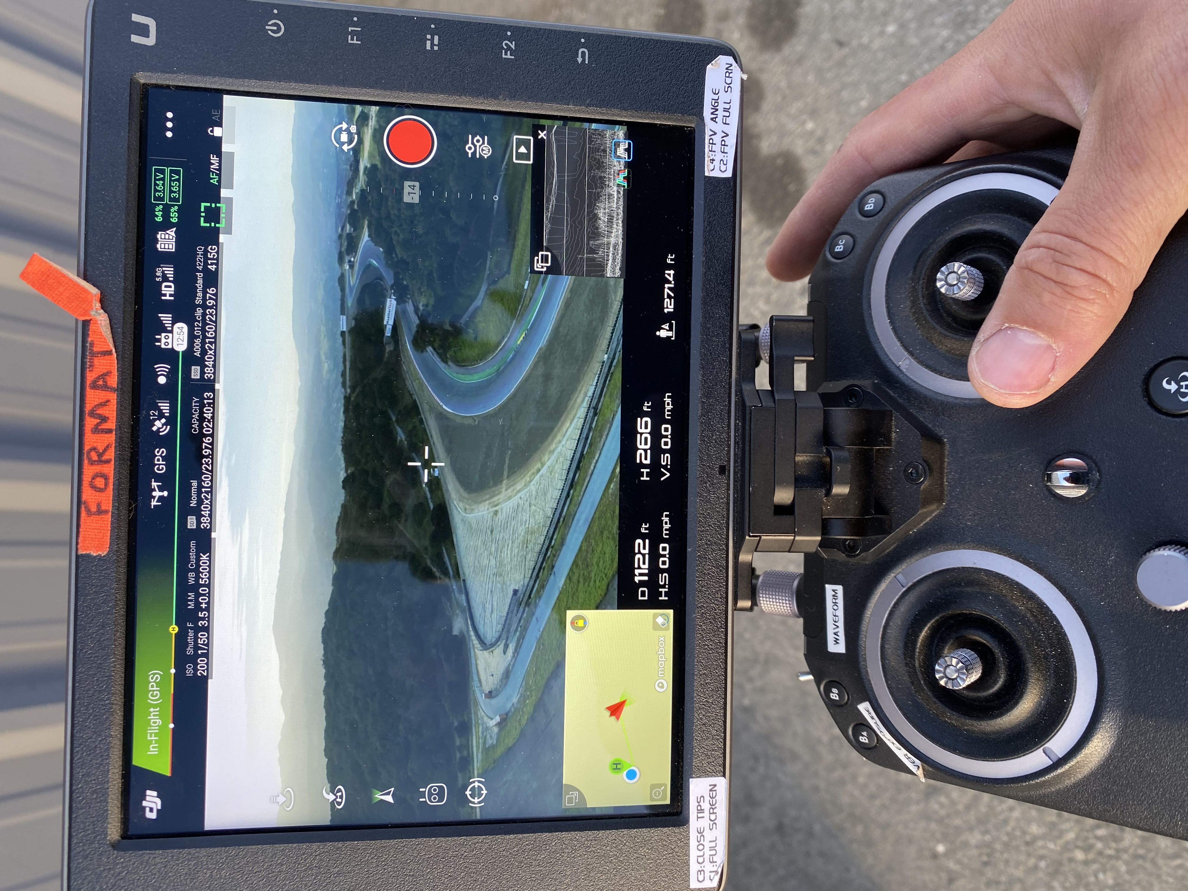 Kyle Decker flying a drone for aerial motorsports cinematography during Harley-Davidson King of the Baggers filming for the Push The Limit series.
