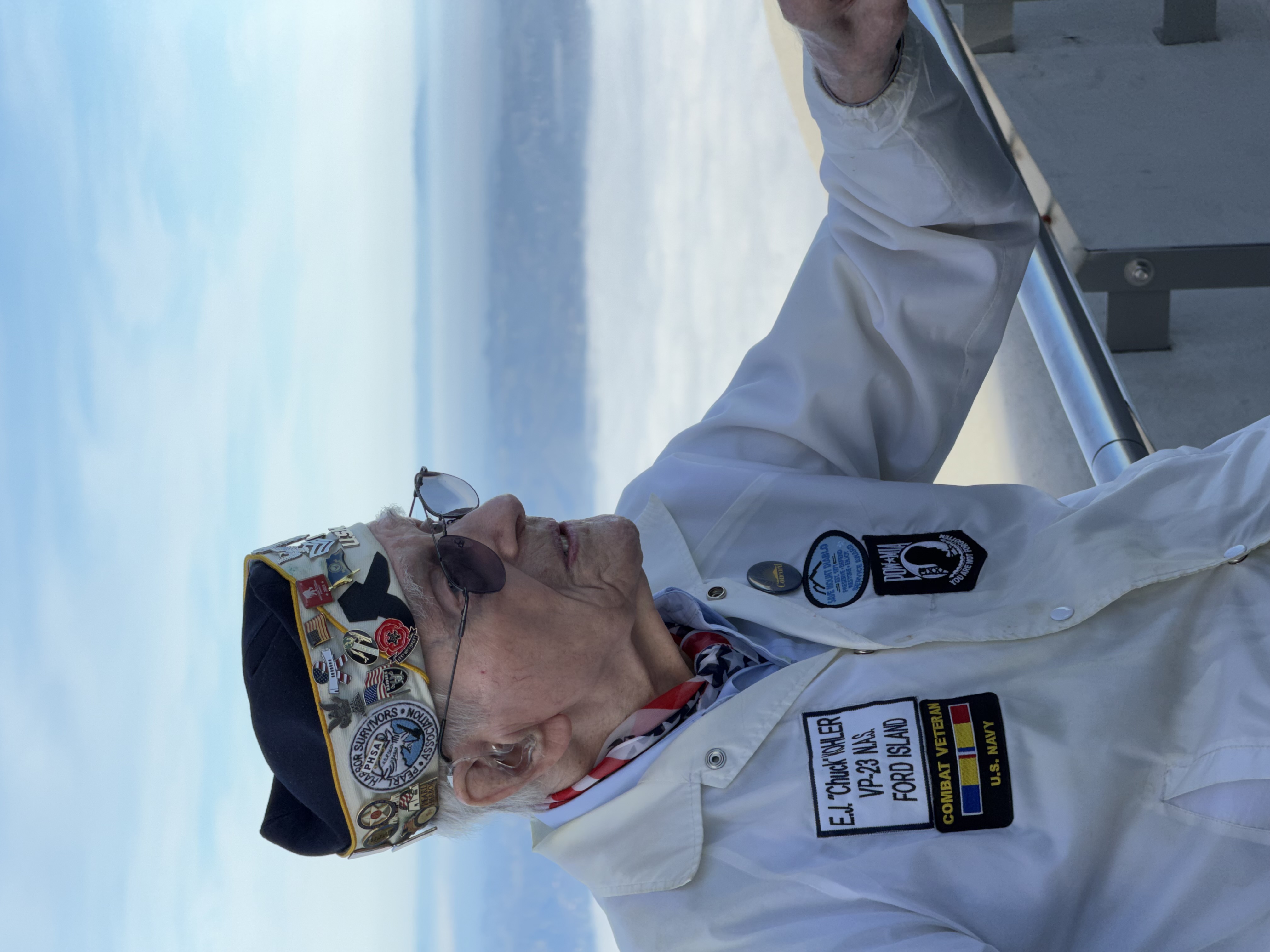 Pearl Harbor survivor Earl "Chuck" Kohler standing at the Mount Diablo summit overlooking the San Francisco Bay Area at sunrise