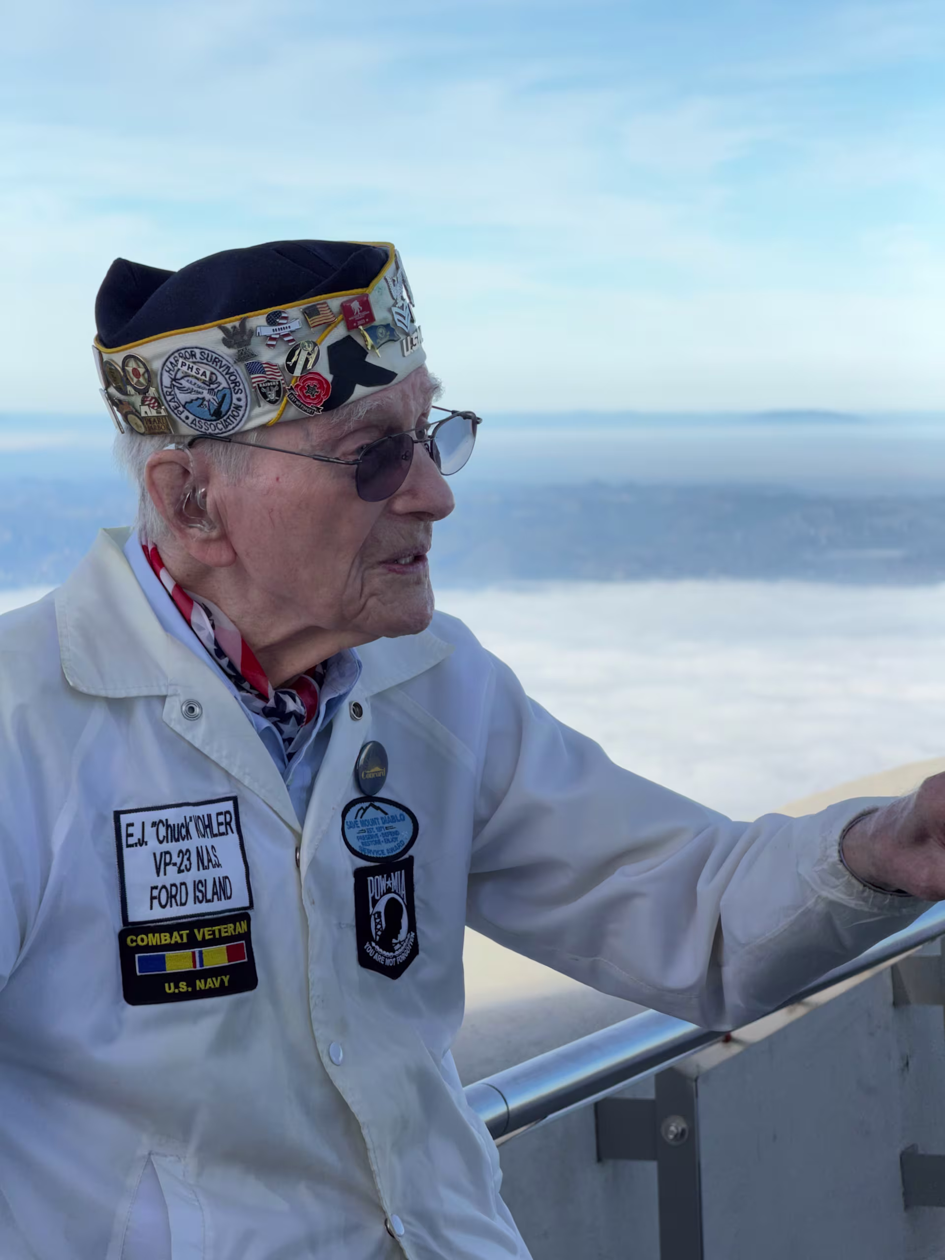Pearl Harbor survivor Earl "Chuck" Kohler standing at the Mount Diablo summit overlooking the San Francisco Bay Area at sunrise