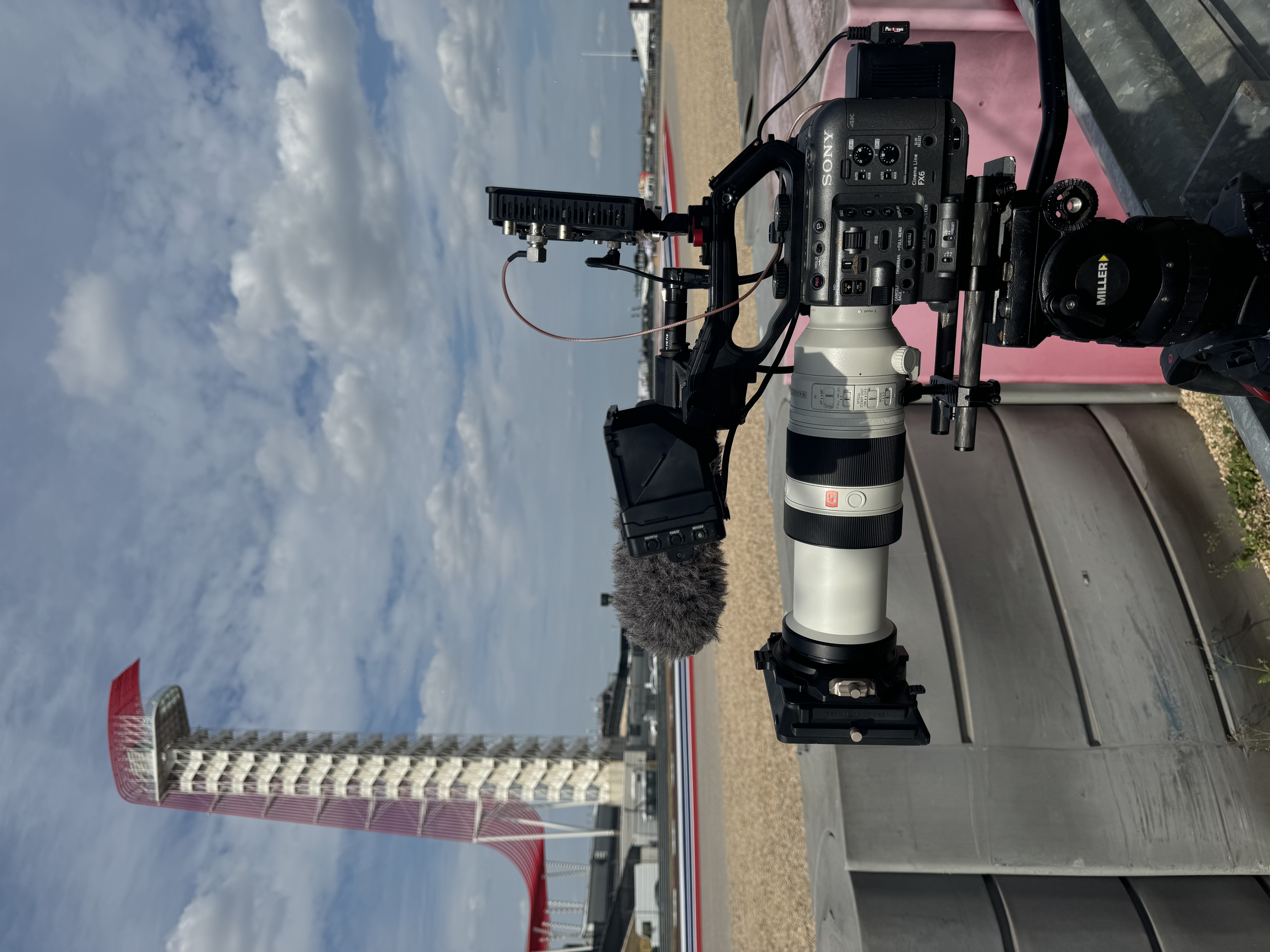 Cinema camera rigged trackside for Harley-Davidson Push The Limit, part of motorcycle racing video production at a King of the Baggers race weekend.