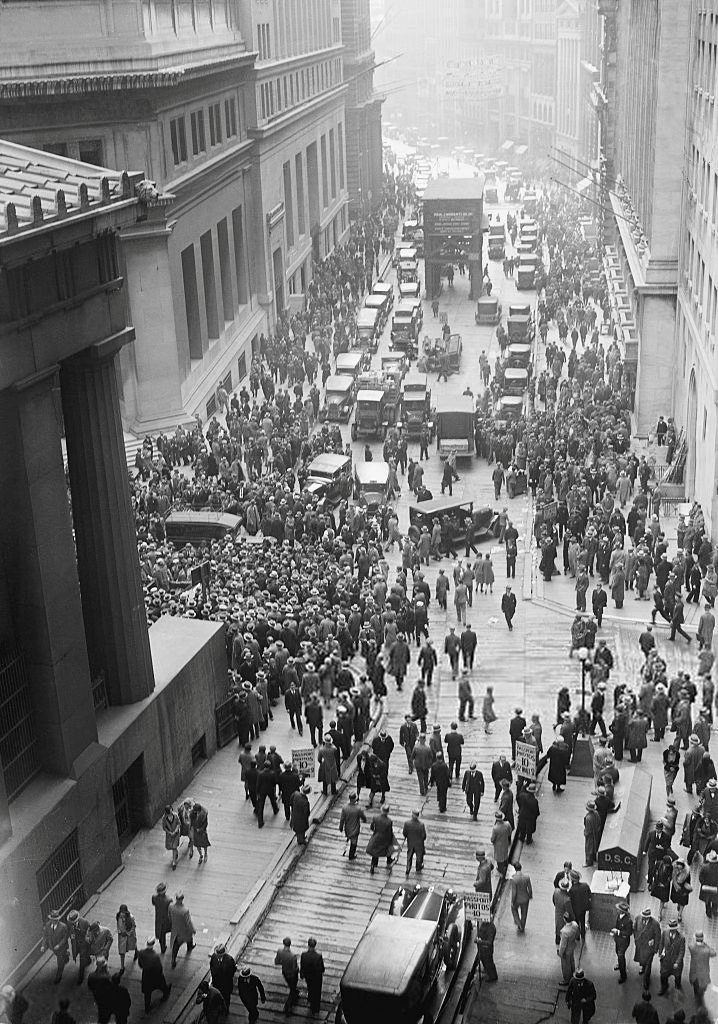 A crowd gathers on Wall Street after the 1929 Crash