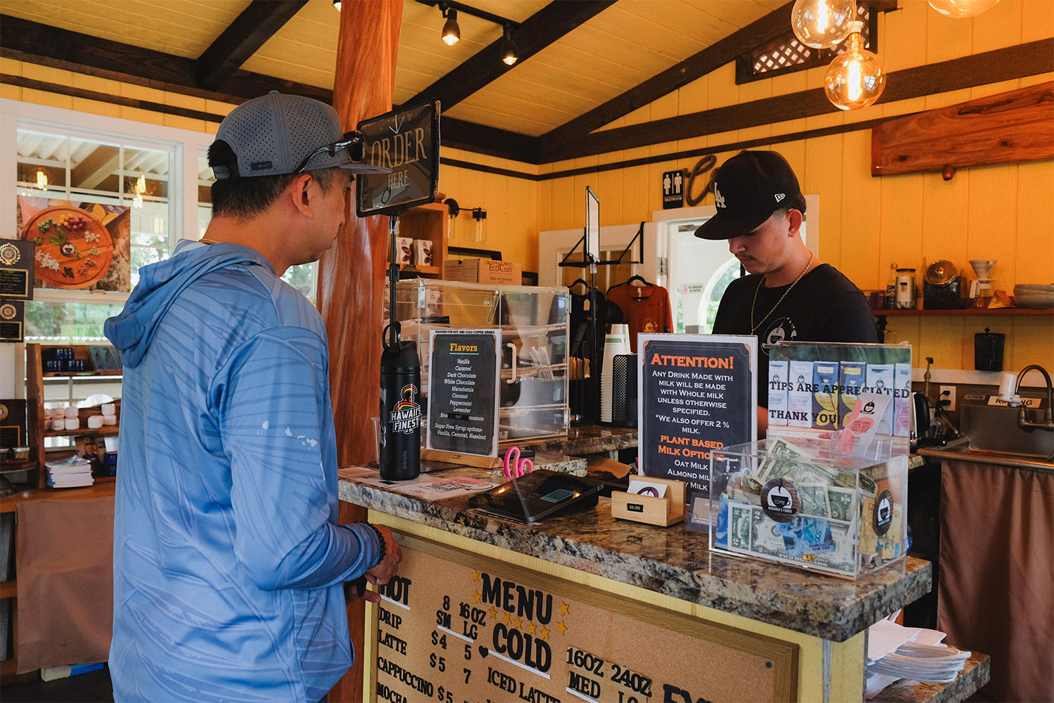 Customer Ordering Coffee at Miranda Farms Coffee Shop and Roastery