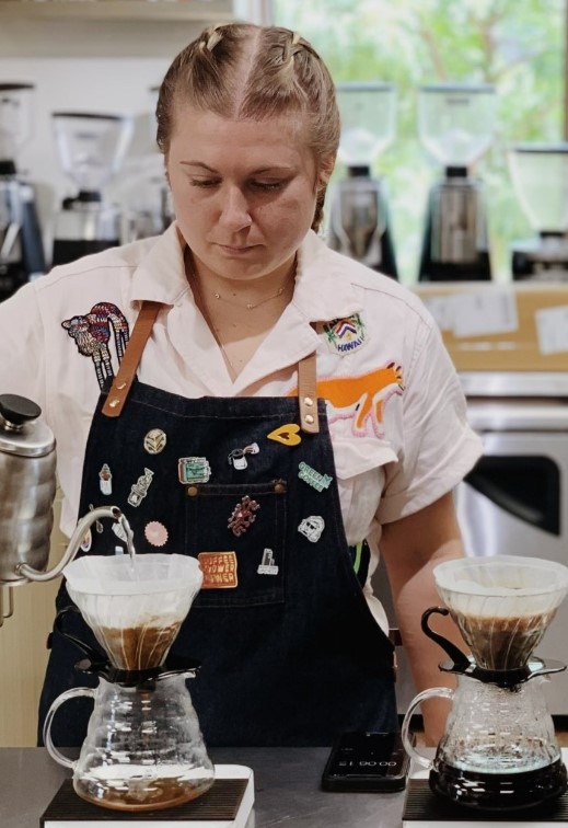 barista Expertly Brewing Pour Over Coffee At OZO Coffee