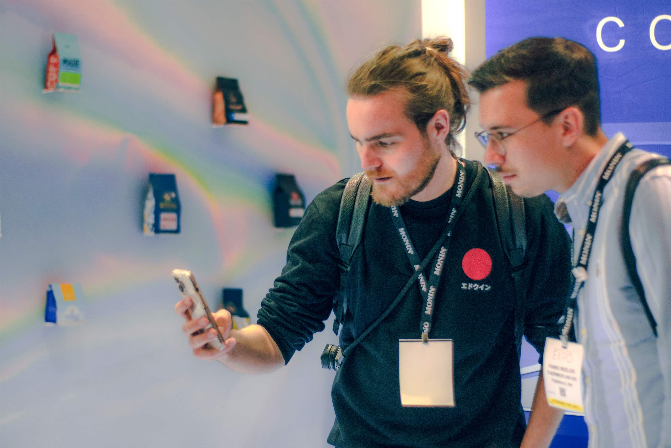 SCA Coffee Expo attendees testing out the Savor Live White Label Coffee Shop App