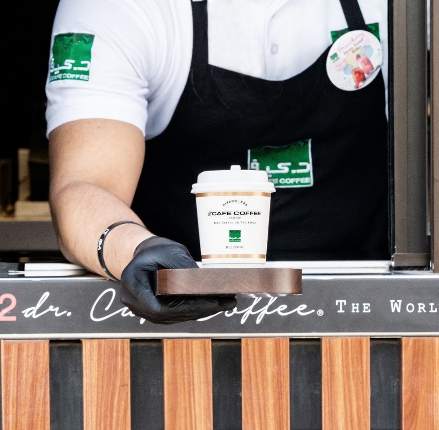 dr.CAFE Coffee team serving coffee.