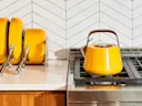 Whistling Tea Kettle - Marigold - On Stove with Marigold Cookware