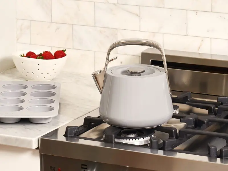Whistling Tea Kettle - Gray - On Stove with Muffin Pan