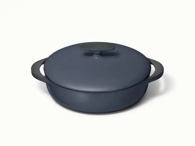 https://images.ctfassets.net/vitsw3itv0qj/201LMuMQTHS4Vt4qPaCGLb/164eb141dc1834955f9cc9be3463785b/Enameled_Cast_Iron_Braiser_-_Navy_-_Hero.jpg?q=75