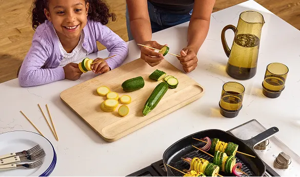 Cutting Board - Cast Iron Grill - Table - July Evergreen - Summer Evergreen - The Backyard, Upgraded - Hero - Mobile