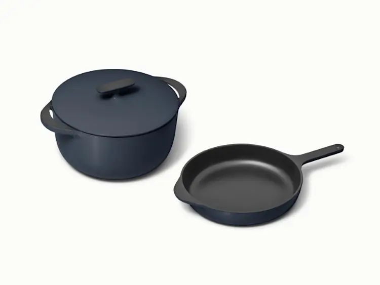 https://images.ctfassets.net/vitsw3itv0qj/3JxhyRT4OQgwdhEuZmjPVh/9bb6fd515eb1ba1561548895dee5c8b5/Enameled_Cast_Iron_Skillet___Dutch_Oven_Duo_-_Midnight_Blue_-_Hero.jpg?q=75
